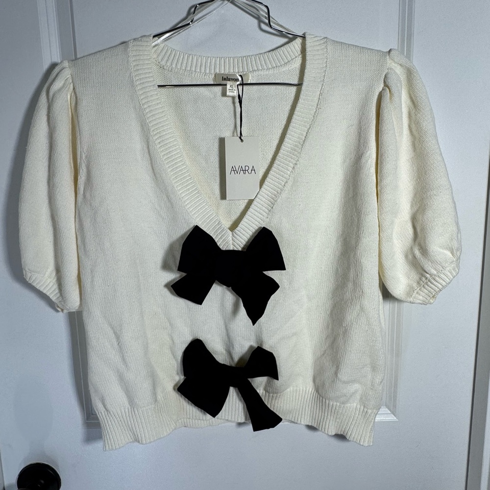 Avara Women's V-Neck Sweater in Cream with Black Bow Details